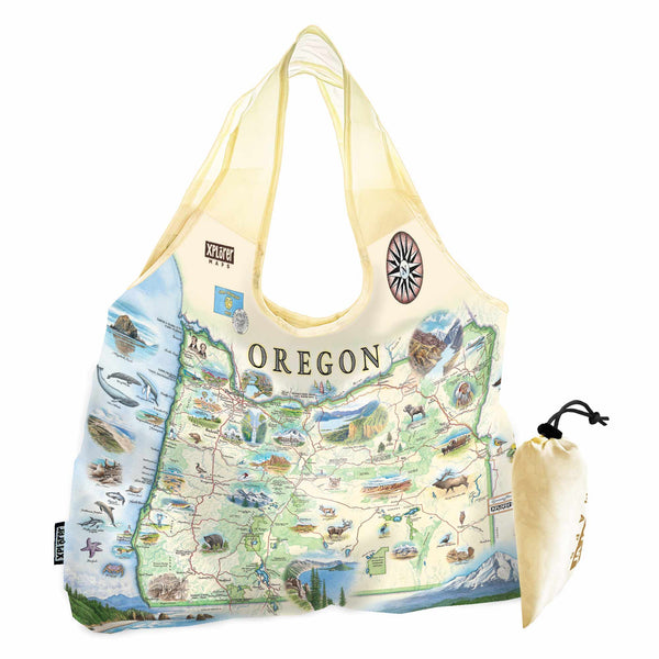 Oregon State Map Pouch Tote Bags by Xplorer Maps. The map features illustrations such as Hells Canyon Snake River, the Columbia River Gorge, Multnomah Falls, and Crater Lake. Flora and fauna include blue whales, big horn sheep, Dungeness crab, Oregon grape, and Douglas Fir.