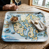 Map-themed tray with 'San Juan Islands' design on a wooden table.