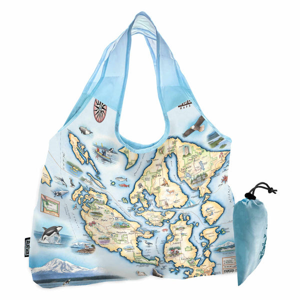 San Juan Islands Map Pouch Tote Bags by Xplorer Maps. The map features illustrations of places such as San Juan Vineyard, Turtleback Mountain Reserve, Liv Winery, and Roche Harbor. Flora and fauna include Orca Whale, Puffin, Herron, camas flower, and rhododendron.