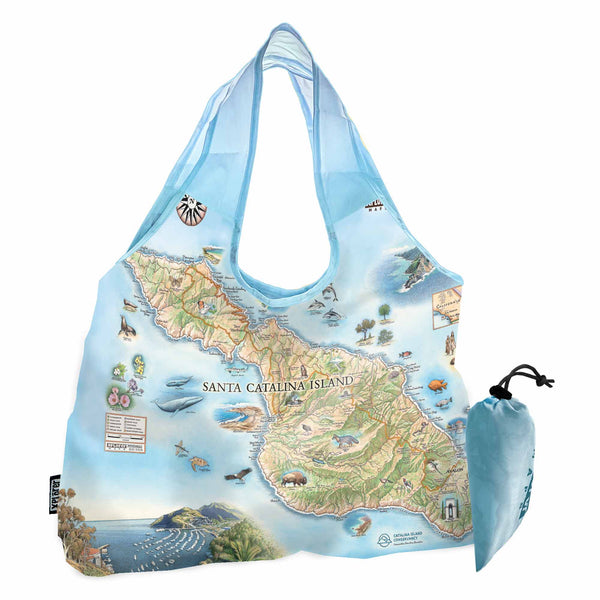 California's Santa Catalina Islands Map Pouch Tote Bags by Xplorer Maps. The map features illustrations of places such as Wrigley Memorial, El Rancho Escondido, and Avalon Bay. Flora and fauna include Bison, Catalina Island Fox, Catalina Orange Lip butterfly, Channel Islands tree poppy, and Island oak. 