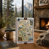 A 1000-piece jigsaw puzzle box titled 'Sequolia & Kings' stands on a wooden table in a cozy room with a fireplace, window view of mountains, and a book nearby.