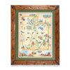 A framed vintage-style Utah map art print with a rustic brown wooden frame, green matting, and colorful illustrated landmarks on a cream background.
