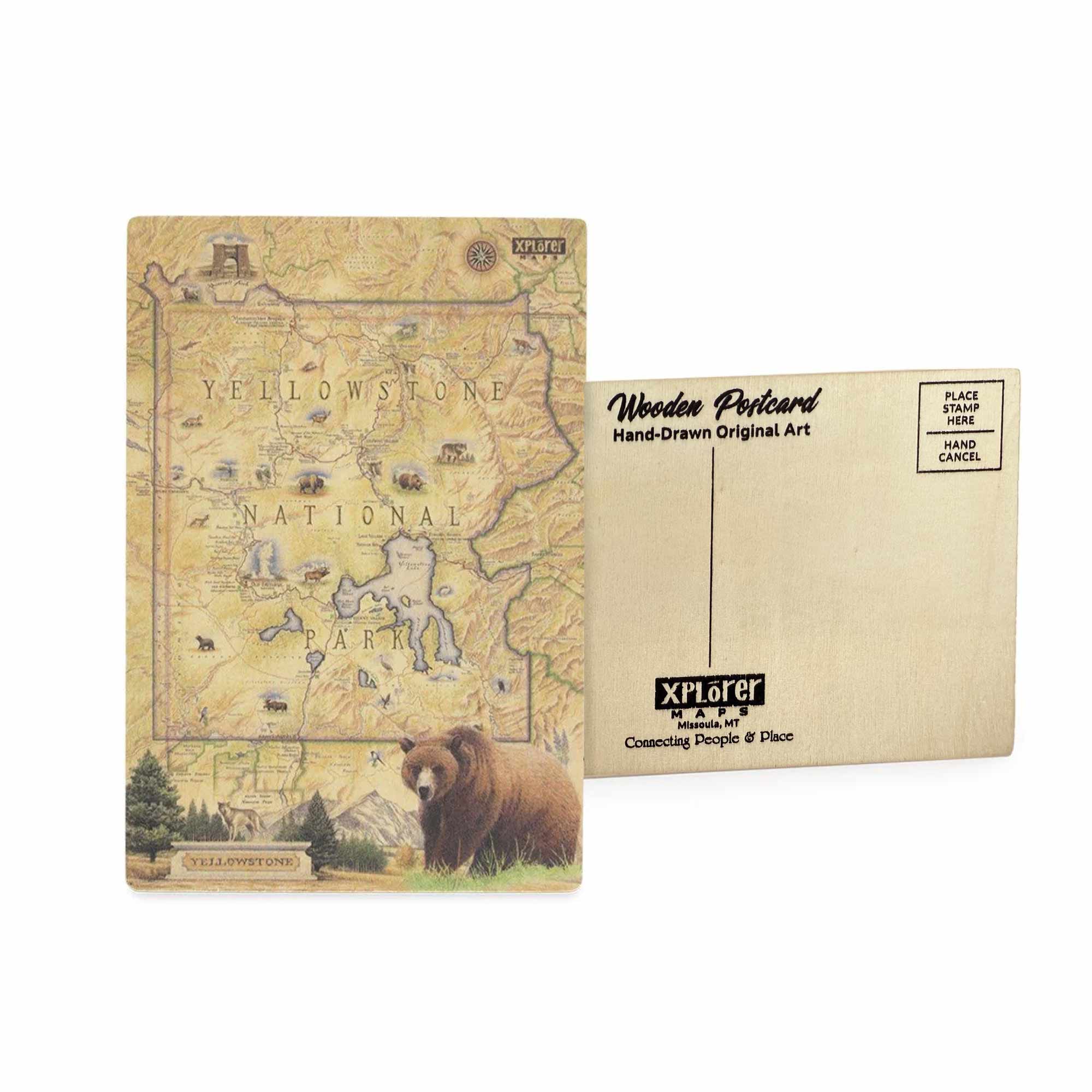Yellowstone National Park Map wooden postcard in earth tone colors featuring hand-drawn illustrations of Old Faithful, Grand Prismatic Spring, and native wildlife including bison and grizzly bears.