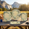 Set of Yosemite serving  trays with map design on a wooden table in a scenic outdoor setting.