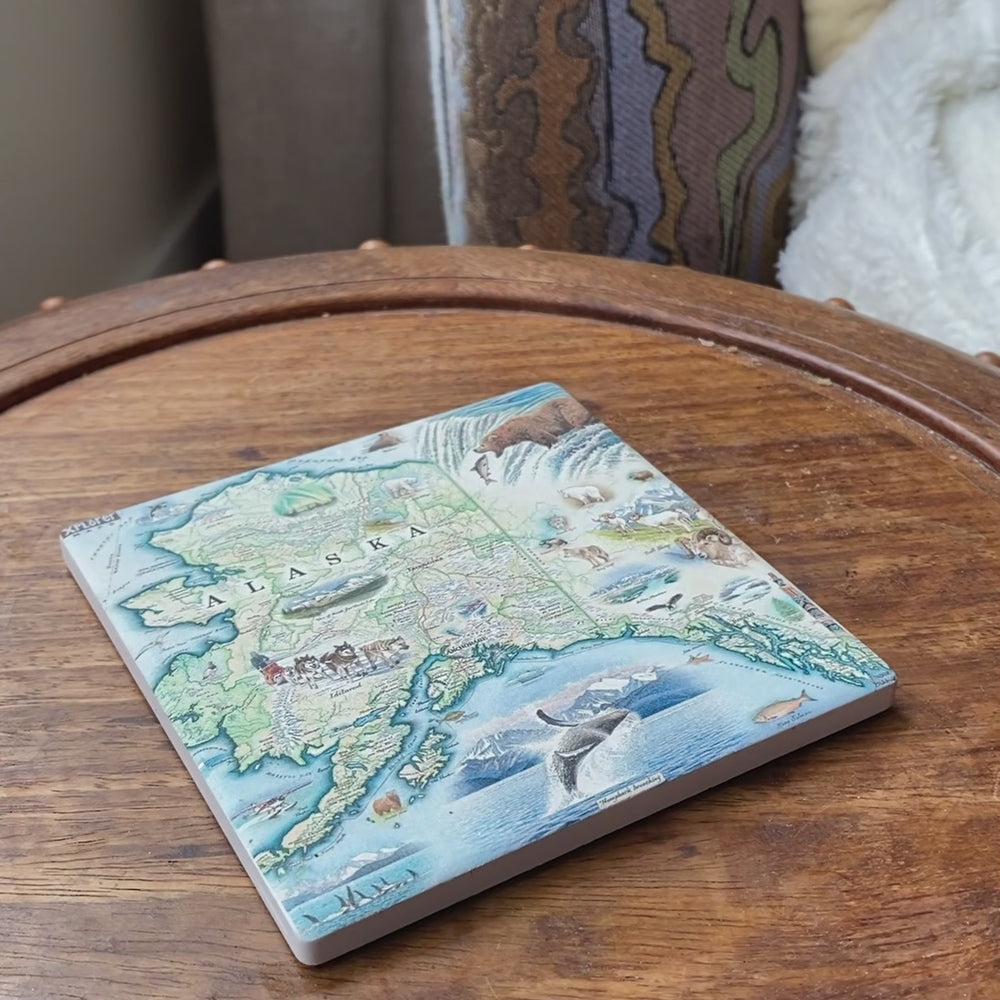 Alaska state ceramic mug by Xplorer Maps with an Alaska ceramic coaster. This video shows the mug being set down on coaster. 