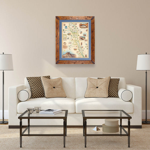 Utah's Capitol Reef National Park in a Montana hand-scraped pine wood frame with a blue mat hanging above a white couch.