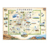 This is a hand-drawn map of Colorado in earthy beige and green tones. It showcases various cities including Denver, Fort Collins, Colorado Springs, Aspen, and Durango. It also features local flora and fauna, such as moose, Rocky Mountain elk, turtles, eagles, and Bighorn Sheep, as well as the indigenous Navajo and Hopi peoples. The map highlights popular activities like hiking, biking, rafting, and skiing. Measuring 24x18