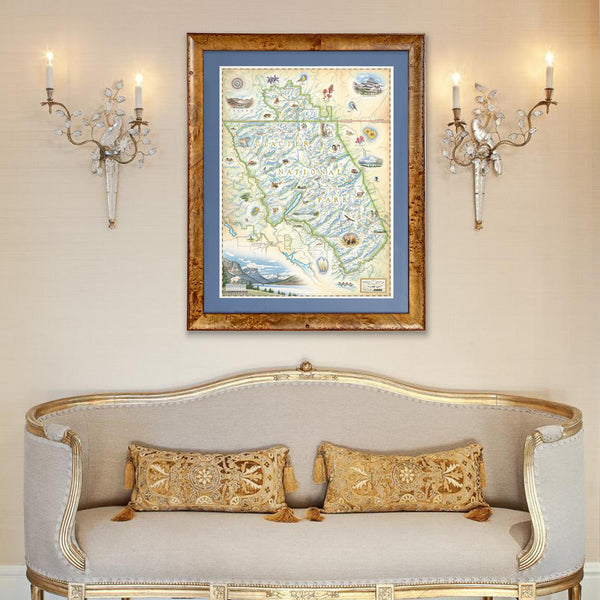 Montana's Glacier National Park hand-drawn map framed above a tan couch. 