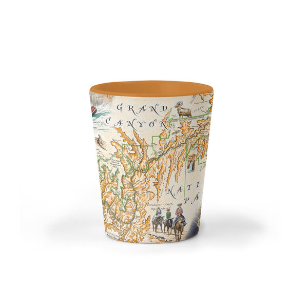 Grand Canyon National Park Map Ceramic shot glass by Xplorer Maps. Features illustrations of activities like whitewater rafting and mule riding, along tortoise, California Condor, and Beavertail Cactus.