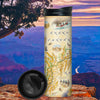Grand Canyon National Park Map Travel Drinkware sitting on a cliff with canyons and ponderosa pine trees in the background. The map features the Colorado River, red rock, Mather Point, Yavapai Observation Station, and architect Mary Colter’s Lookout Studio and her Desert View Watchtower. illustrations of activities like whitewater rafting and mule riding, along tortoise, California Condor, and Beavertail Cactus.