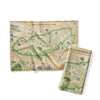 The Great Smoky Mountains National Park Map Kitchen Dishwashing Towel in earth tones colors of blue, beige, and green. The map depicts the entire National Park on the border of North Carolina and Tennessee. It features illustrations of a salamander, woodpecker, Clingman's Dome, Sugarland's Visitor Center, and Oconoluftee Visitor Center. 