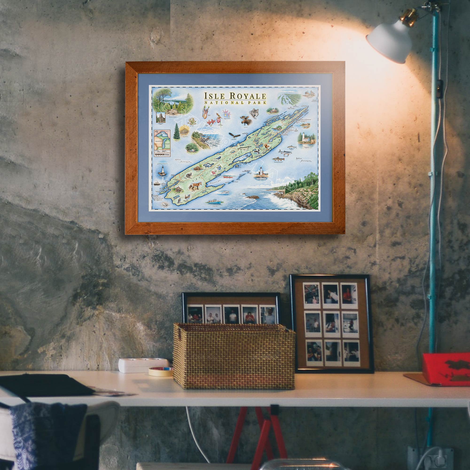 Isle Royale National Park hand-drawn map hanging on a gray marble like wall in a reclaimed Montana Flathead Lake frame with blue mat in an office. 