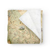 Folded fleece blanket with map of Montana on it. Blanket measures 58"x50."