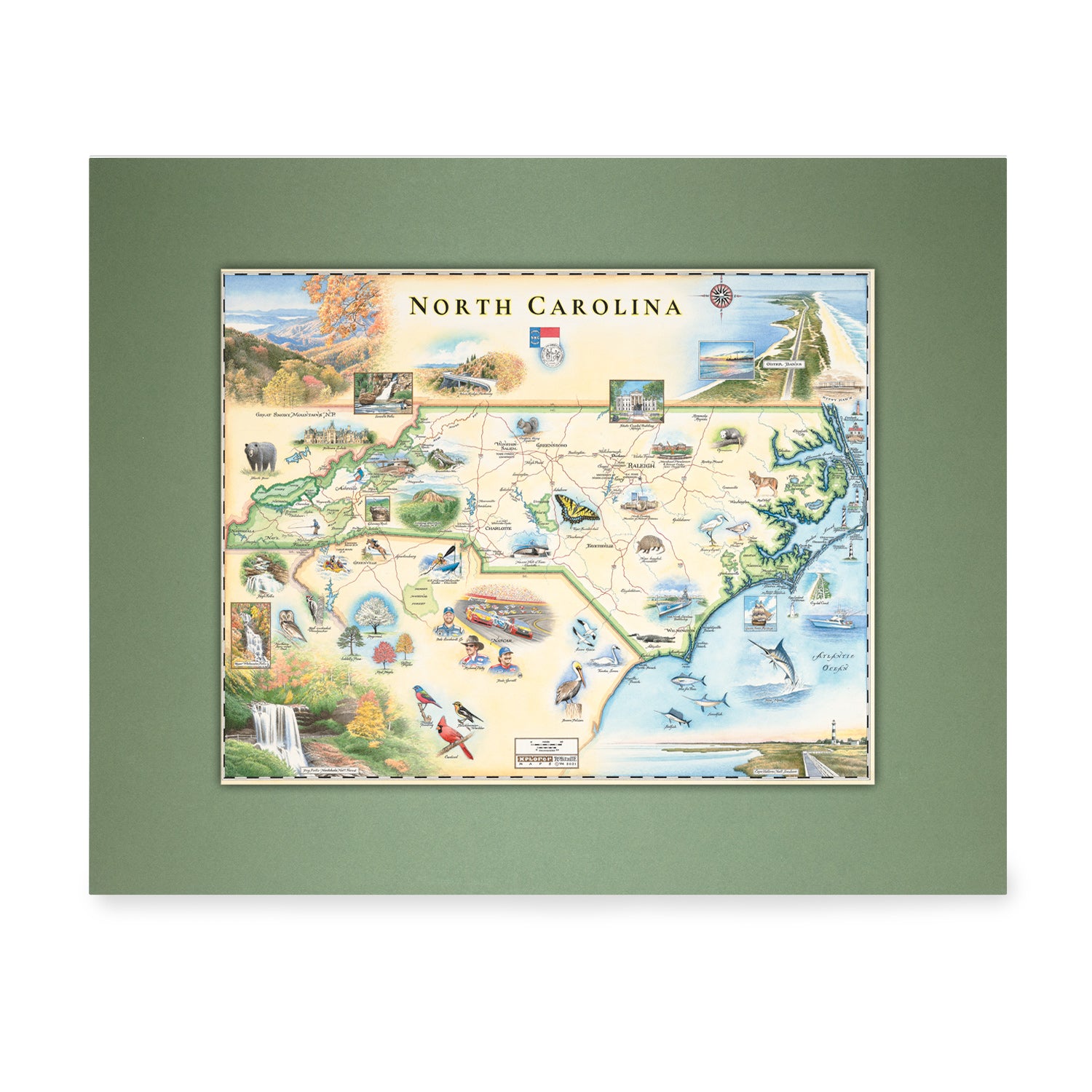 North Carolina State Mini-Map by Xplorer Maps. The map features Dry Falls in the Nantahala National Forest, the Outer Banks, a Nascar Hall of Fame, and the USS North Carolina on the coast. 