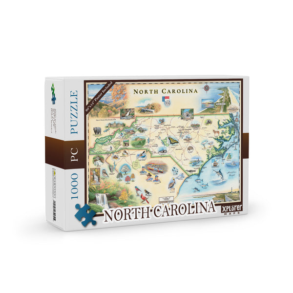North Carolina State Map Jigsaw Puzzles by Xplorer Maps. The map features Dry Falls in the Nantahala National Forest, the Outer Banks, a Nascar Hall of Fame, and the USS North Carolina on the coast.