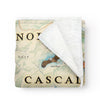 Folded blanket with map of North Cascades National Park. Soft and cozy art blanket. Measures 58"x50."