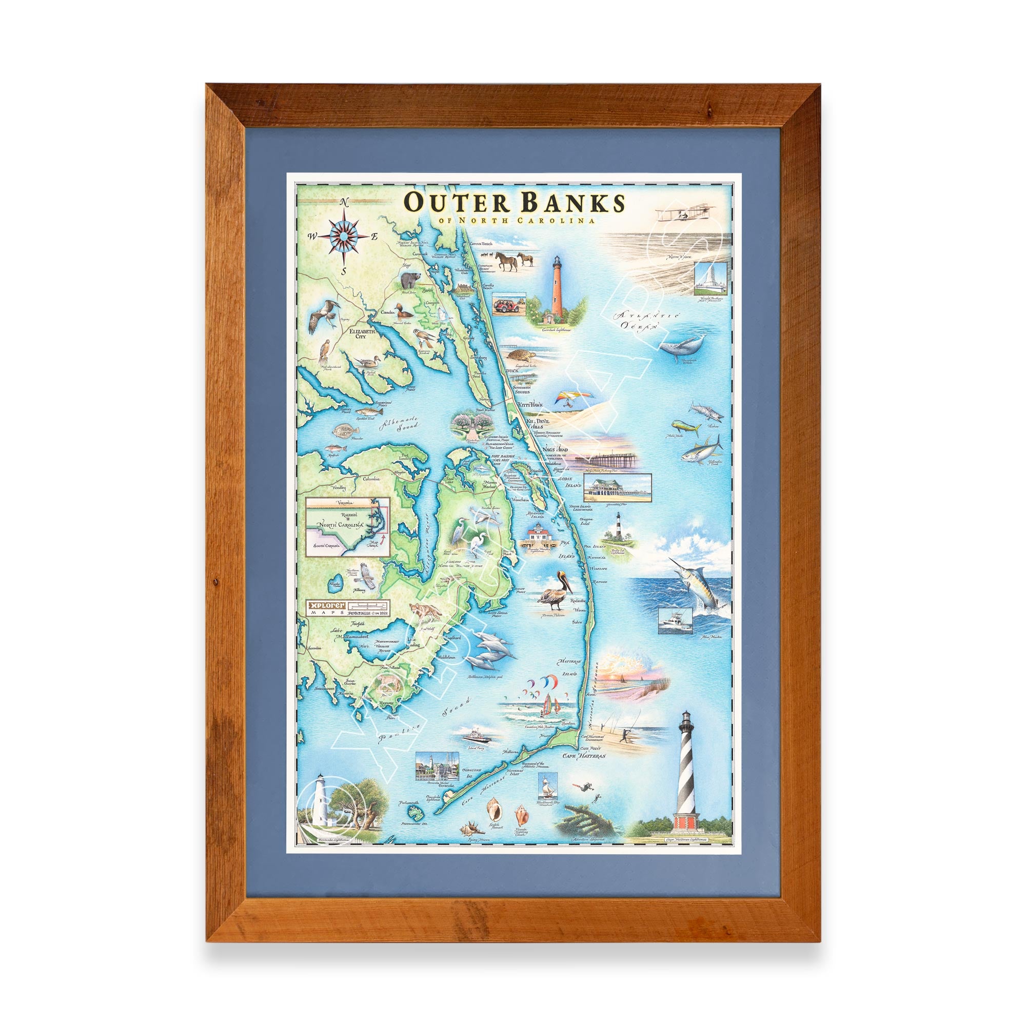 North Carolina's Outer Banks (OBX) hand-drawn map in earth tones blues and greens. The map print is framed in reclaimed Montana Flathead Lake Larch with blue mat. 