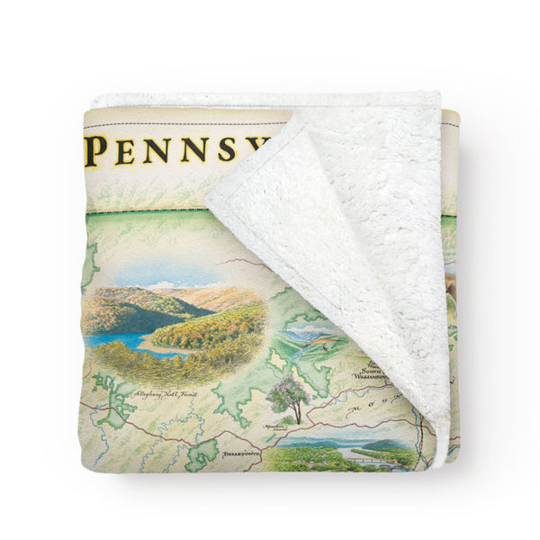 Folded fleece blanket with a map of Pennsylvania on it. Measures 58"x50." The picture of the throw is of the Poconos. 