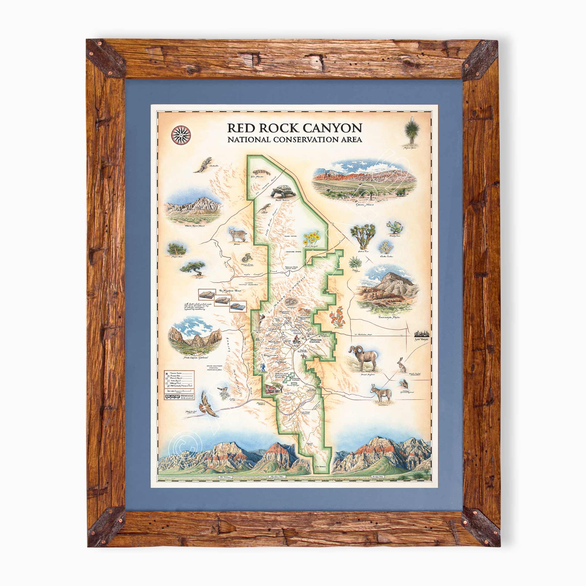 Red Rock Canyon National Recreation Area hand-drawn map in earth tones blues and greens. The map print is framed in Montana hand-scraped pine with a blue mat.