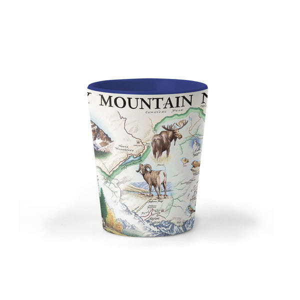 Rocky Mountain National Park Map Ceramic shot glass. The map features illustrations of places like Trail Ridge Road, Mount Ganby, Estes Park, and the Alpine Visitor Center. Flora and fauna include bobcats, snowshoe hares, Indian paintbrushes, and wild roses. 