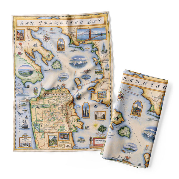 San Francisco Bay Map Kitchen Towels in earth tones of beige, green, and blue. The map features illustrations of places such as Candlestick Park, Fisherman's Wharf, Transamerica Pyramid, and Alcatraz Island. Include octopus, crab, palm trees, and a dahlia.