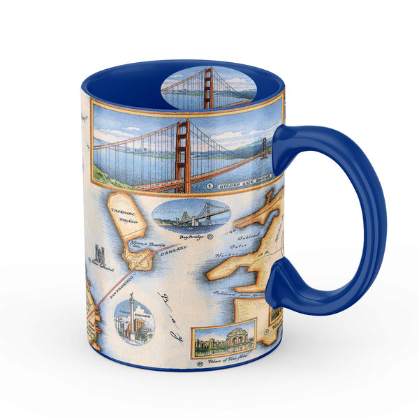 Blue 16 oz San Francisco Bay Map Ceramic Mug. The map features illustrations of places such as Candlestick Park, Fisherman's Wharf, Transamerica Pyramid, and Alcatraz Island. Flora and fauna include octopus, crab, palm trees, and a dahlia.