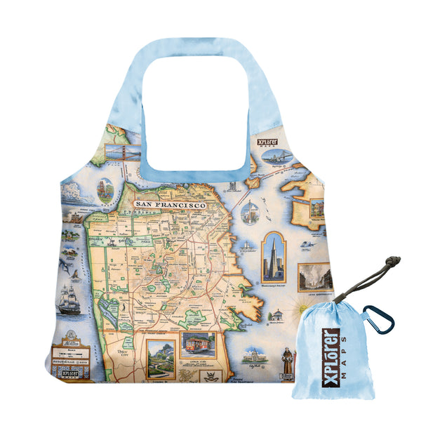 San Francisco Bay Map Pouch Tote Bags by Xplorer Maps. The map features illustrations of places such as Candlestick Park, Fisherman's Wharf, Transamerica Pyramid, and Alcatraz Island. Flora and fauna include octopus, crab, palm trees, and a dahlia. 