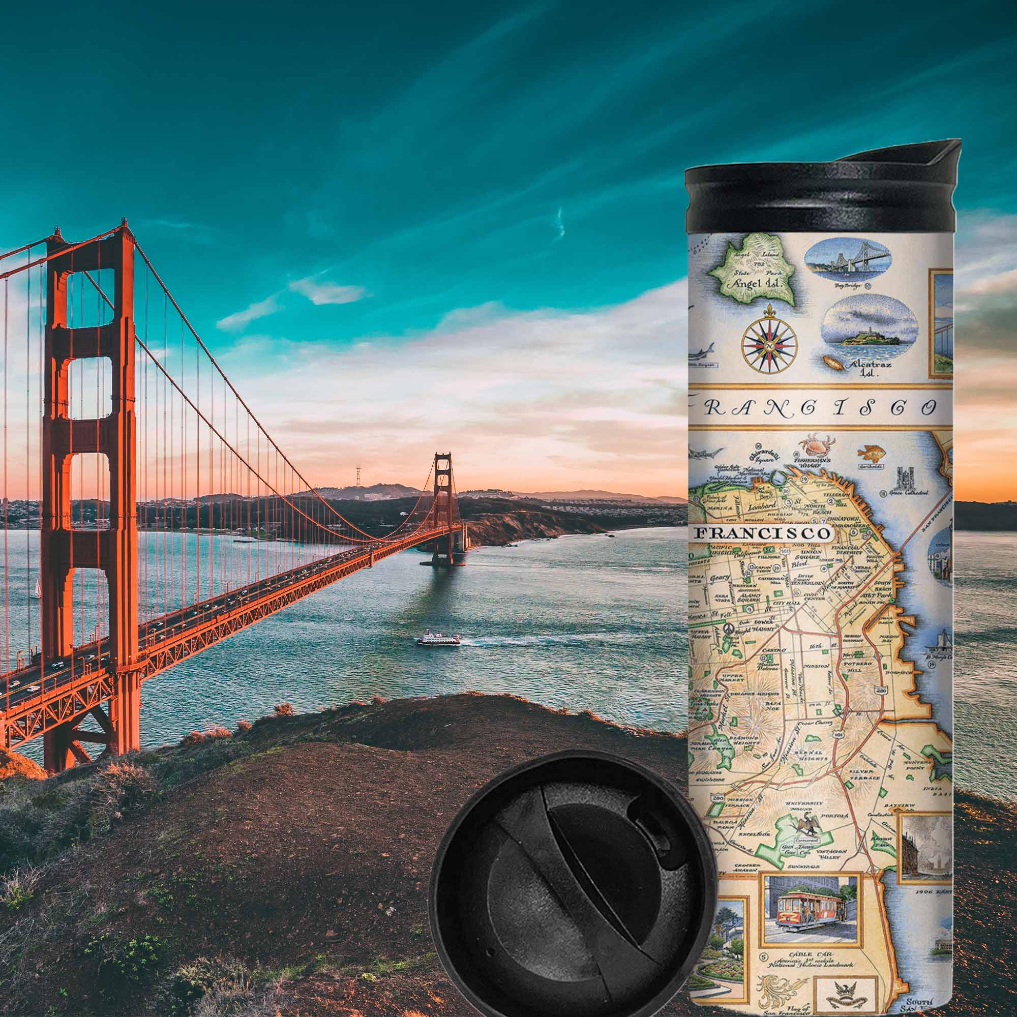 San Francisco Bay Map 16 oz Travel thermos mug with Golden Gate Bridge in the background.  The map features illustrations of places such as Candlestick Park, Fisherman's Wharf, Transamerica Pyramid, and Alcatraz Island. Flora and fauna include octopus, crab, palm trees, and a dahlia. 