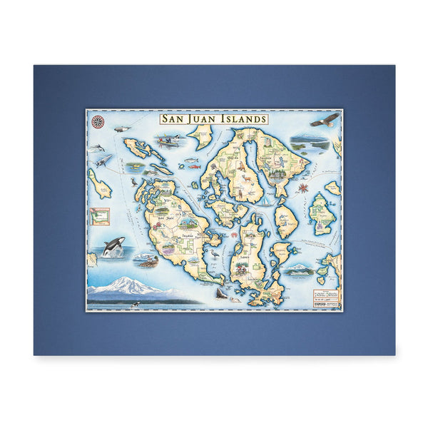 San Juan Islands Mini-Map by Xplorer Maps in earth tones blue and green. The map features illustrations of places such as San Juan Vineyard, Turtleback Mountain Reserve, Liv Winery, and Roche Harbor. Flora and fauna include Orca Whale, Puffin, Herron, camas flower, and rhododendron.