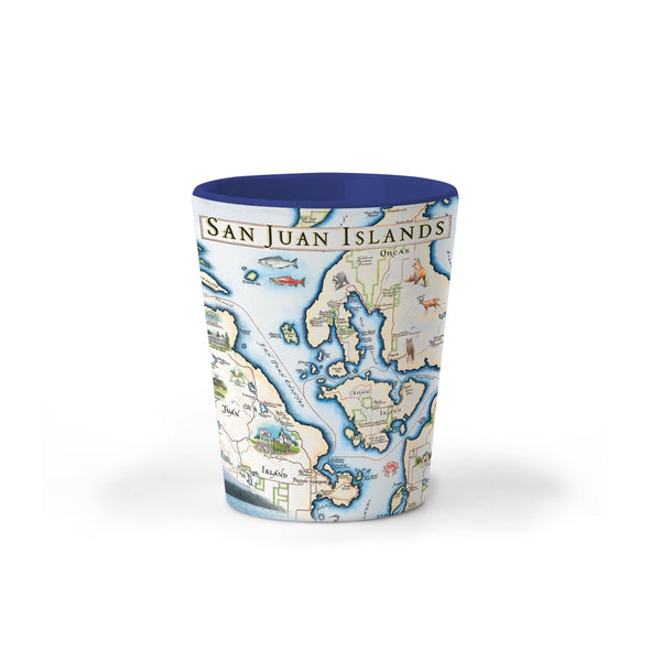 Washington's San Juan Islands Map Ceramic shot glass by Xplorer Maps. The map features illustrations of places such as San Juan Vineyard, Turtleback Mountain Reserve, Liv Winery, and Roche Harbor. Flora and fauna include Orca Whale, Puffin, Herron, camas flower, and rhododendron.