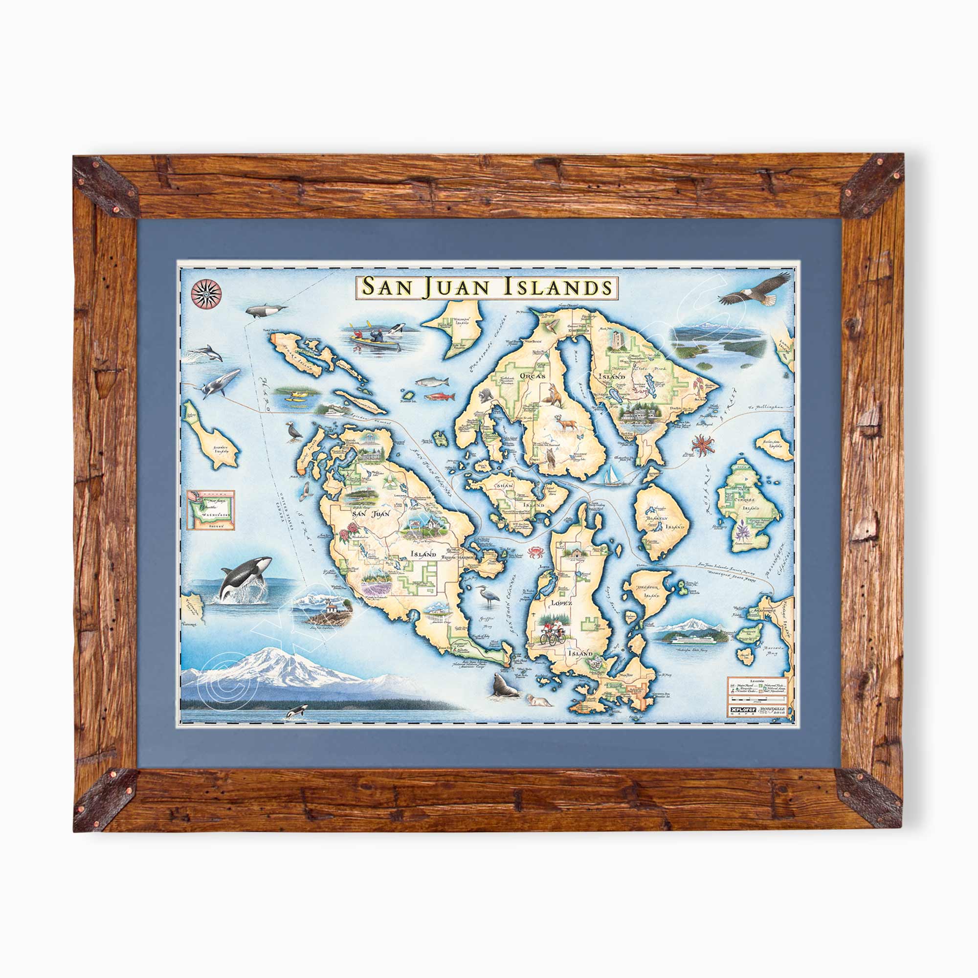 San Juan Islands hand-drawn map in earth tones blues and greens. The map print is framed in Montana hand-scraped pine with a blue mat.