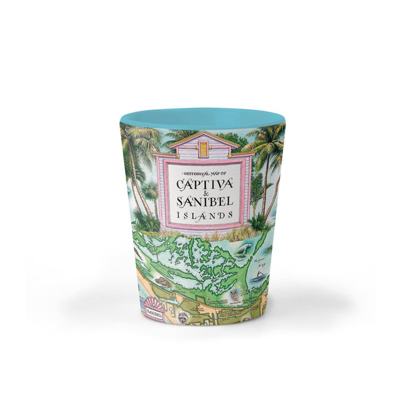 Florida's Sanibel & Captiva Islands Map Ceramic shot glass by Xplorer Maps. The map features illustrations of places such as Ding Darling Wildlife Sanctuary, Bailey-Matthews Shell Museum, and Sanibel Lighthouse. Flora and fauna include the Loggerhead sea turtle, Manatee, and Great Blue Heron. Many other birds and sea animals are illustrated.