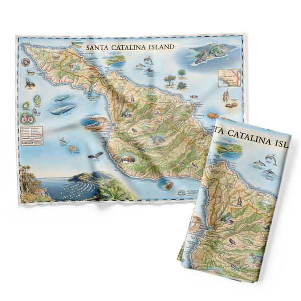 California's Santa Catalina Island Map Kitchen Towels in blue and green. Located off the coast of California. The map features illustrations of places such as Wrigley Memorial, El Rancho Escondido, and Avalon Bay. Include Bison, Catalina Island Fox, Catalina Orange Lip butterfly, Channel Islands tree poppy, and Island oak.