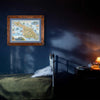 Santa Catalina Island Hand-drawn map hanging over a twin bed. The moon is shining on a blue wall.