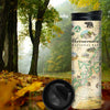 Shenandoah National Park Map travel thermos mug with forest with yellow and green leaves. The map includes illustrations of places such as Skyline Drive, Byrd Visitor Center, and Big Meadows Lodge. Flora and fauna include bobcats, wild turkeys, trillium flowers, a dogwood tree, and a black bear with cubs. 