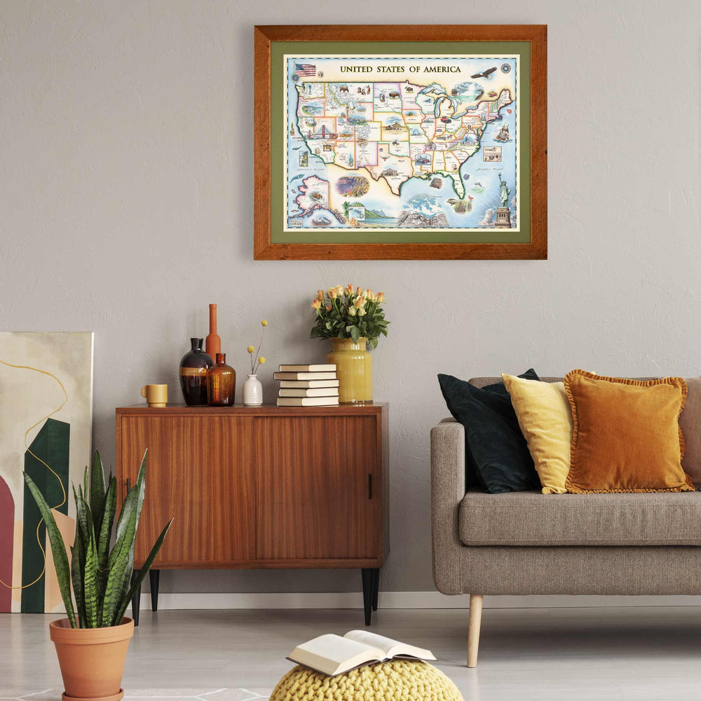 USA Map framed in Montana Flathead Lake Larch. The print is hanging above a table next to the couch. 