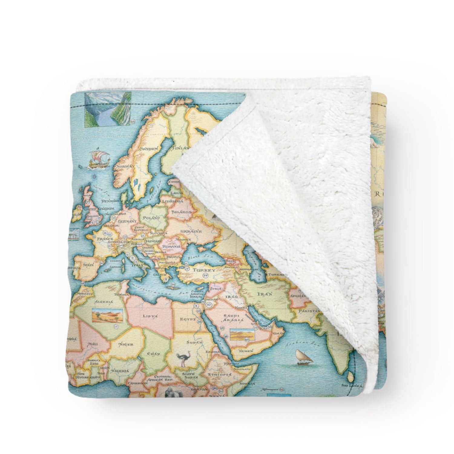 Folded fleece blanket with map of the World on it. Soft and cozy map blanket