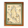 Africa's Zanzibar hand-drawn map in earth tones blues and greens. The map print is framed in reclaimed Montana Flathead Lake Larch with a green mat.